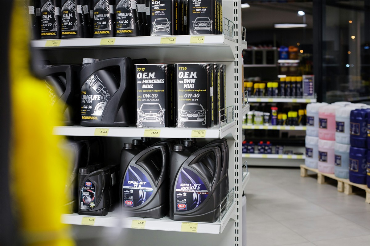Retail shelves stocked with lubricants and oils